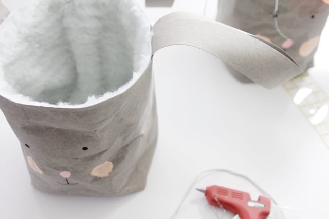 DIY Bunny Basket | See Kate Sew Made with kraft tex and lined with fur!