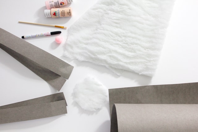 DIY Bunny Basket | See Kate Sew Made with kraft tex and lined with fur!