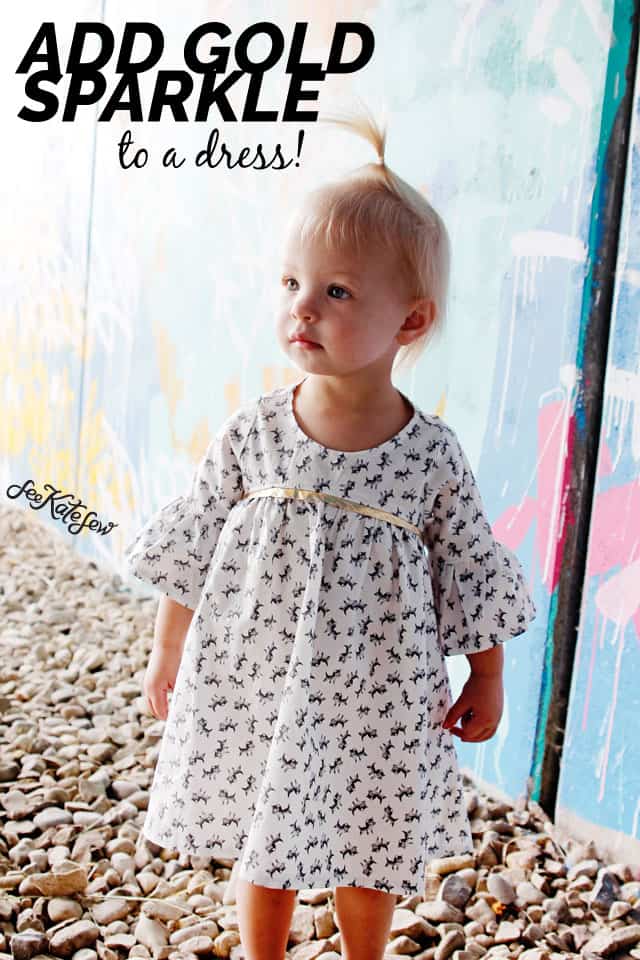 Add Gold Sparkle to a Dress! | DIY Girls Dresses | DIY Girls Dresses with Gold Sparkle | Emma Dress Pattern | Riley Blake Fabric Tour | Petite Treat Cat Dress | How to Sew Girls Dresses | Girls Dress Pattern | How to Add Bias Tape to a Dress || See Kate Sew #girlsdresses #diygirlsdresses #diykidsclothes #rileyblake #petitetreat #biastape #goldsparkle #seekatesew