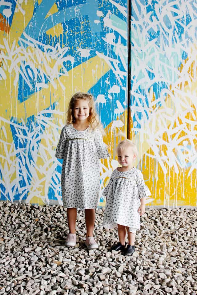 Add Gold Sparkle to a Dress! | DIY Girls Dresses | DIY Girls Dresses with Gold Sparkle | Emma Dress Pattern | Riley Blake Fabric Tour | Petite Treat Cat Dress | How to Sew Girls Dresses | Girls Dress Pattern | How to Add Bias Tape to a Dress || See Kate Sew #girlsdresses #diygirlsdresses #diykidsclothes #rileyblake #petitetreat #biastape #goldsparkle #seekatesew