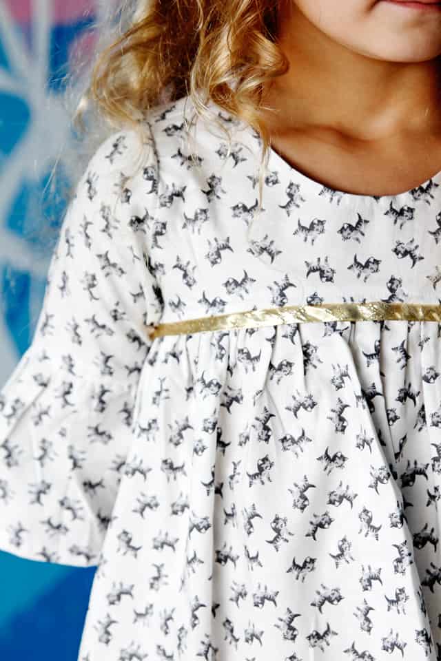 Add Gold Sparkle to a Dress! | DIY Girls Dresses | DIY Girls Dresses with Gold Sparkle | Emma Dress Pattern | Riley Blake Fabric Tour | Petite Treat Cat Dress | How to Sew Girls Dresses | Girls Dress Pattern | How to Add Bias Tape to a Dress || See Kate Sew #girlsdresses #diygirlsdresses #diykidsclothes #rileyblake #petitetreat #biastape #goldsparkle #seekatesew