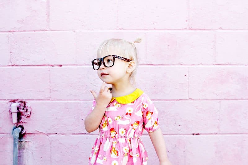 The Olivia Dress sewing up in gorgeous quilting cotton with a bright yellow collar to match! Simple lines with a few really cute features! Simple to get on your kiddo, the waistline is elastic and it just slips right on! Plus...Pockets! || See Kate Sew #dresspatterns #kidsfashion #dresses #seekatesew