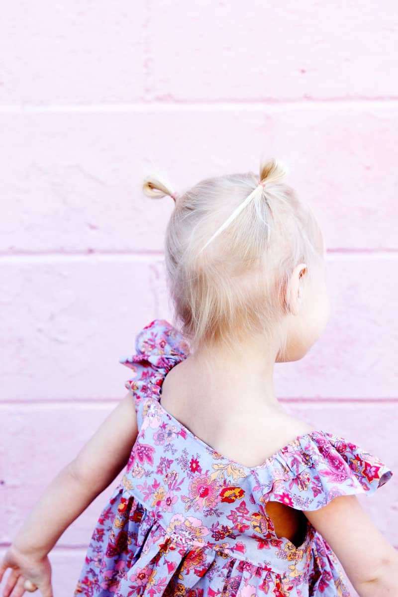 I designed the Easy Summer Dress to use with my favorite quilting cottons but after making it in lightweight lawn, I'm in love! This dress is fun and fast to make! it's perfect for pulling on over a swimsuit and also dries quickly! || See Kate Sew #girlsdresses #dresspattern #rileyblake #girlsfashion #seekatesew