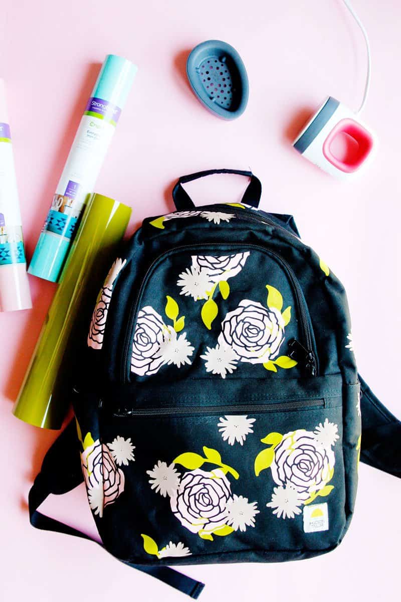 This FREE TUTORIAL on How To Iron-on Vinyl on a Backpack with the Cricut EasyPress 2 Mini will show you how to give an old backpack a revamp! || See Kate Sew #cricutcrafts #cricuttutorial #freetutorial #easypress2 #seekatesew