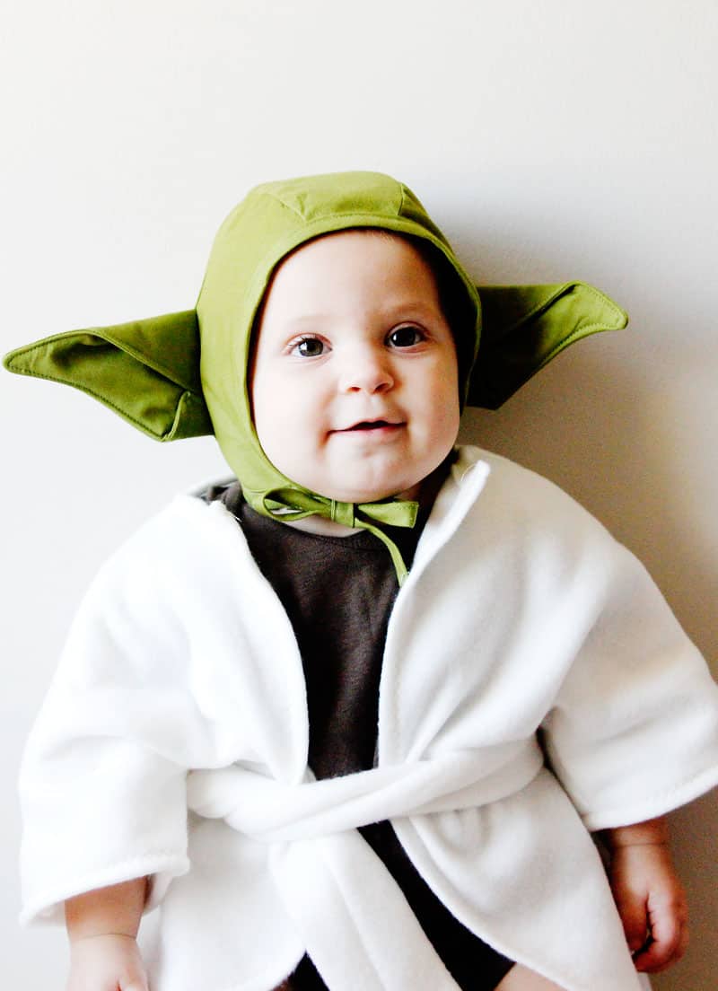 This DIY Yoda Baby Costume is only 3 pieces and really easy to create! A free download and able to fit most baby sizes, it's perfect for any Star Wars fans! || See Kate Sew #diybabycostume #starwarscostume #diyyoda #diyhalloweencostume #diyhalloween #seekatesew