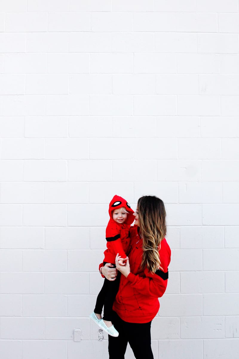 Spider-Man is a great easy costume to make for Halloween! Easy to make using red hoodies and black leggings, these costumes are quick and kid-friendly. || See Kate Sew #diyhalloween #diycostumes #spidermancostumes #spiderman #seekatesew