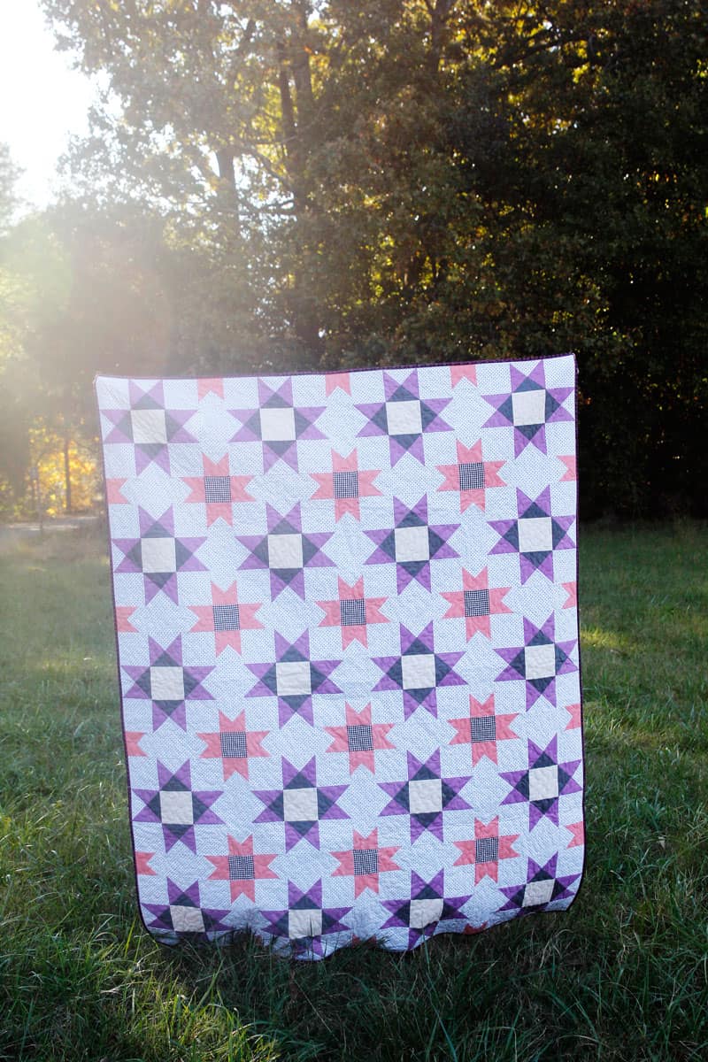 With a design of stars and diamonds and a fun color palette, The Farmhouse Quilt, is the perfect first quilt pattern for Pattern of the Month! with fresh patterns on the 1st of every month, you will always have a project ready to go! || See Kate Sew #rileyblake #farmhousequilt #patternofthemonth #kissmekate #quiltpatterns #quilts #seekatesew