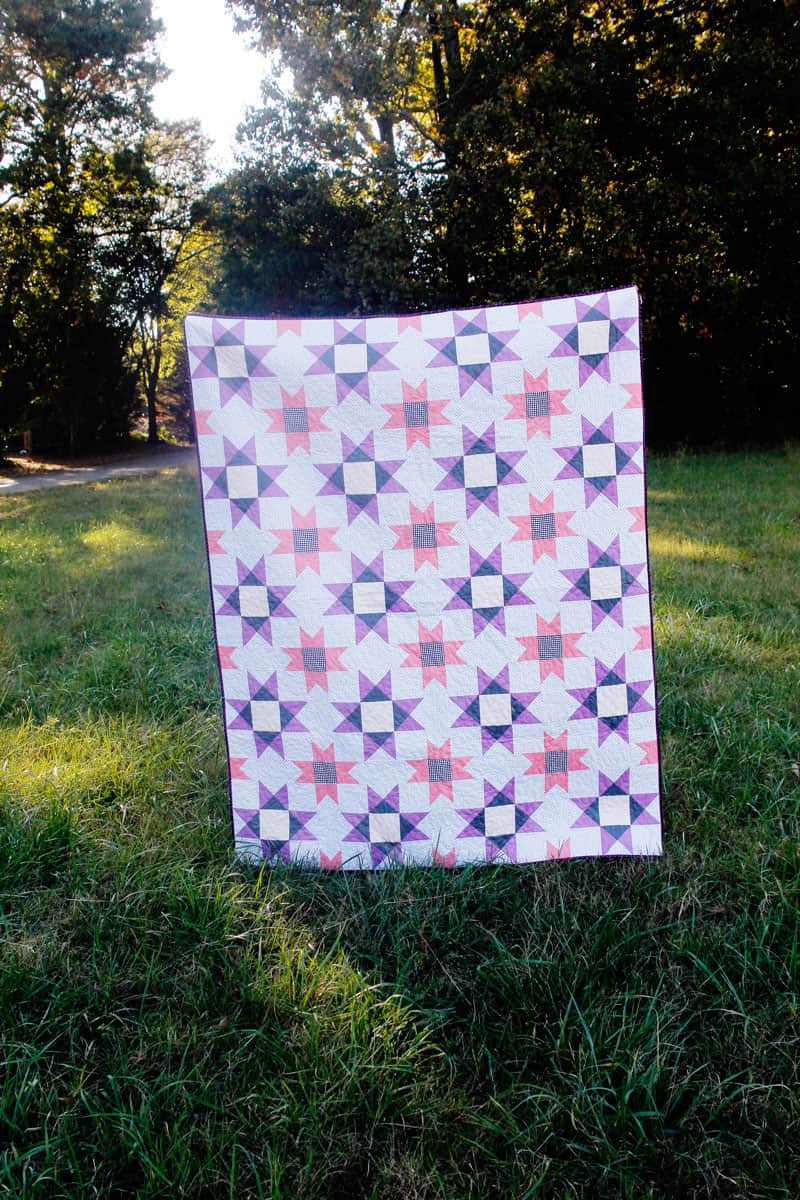 With a design of stars and diamonds and a fun color palette, The Farmhouse Quilt, is the perfect first quilt pattern for Pattern of the Month! with fresh patterns on the 1st of every month, you will always have a project ready to go! || See Kate Sew #rileyblake #farmhousequilt #patternofthemonth #kissmekate #quiltpatterns #quilts #seekatesew