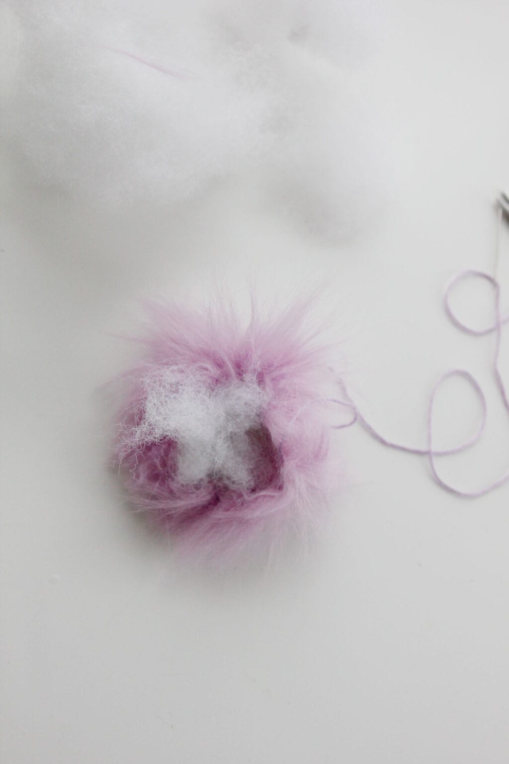 How to make faux fur pom poms see kate sew